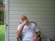 Clarence "Sonny" Miller relaxing on porch 2013